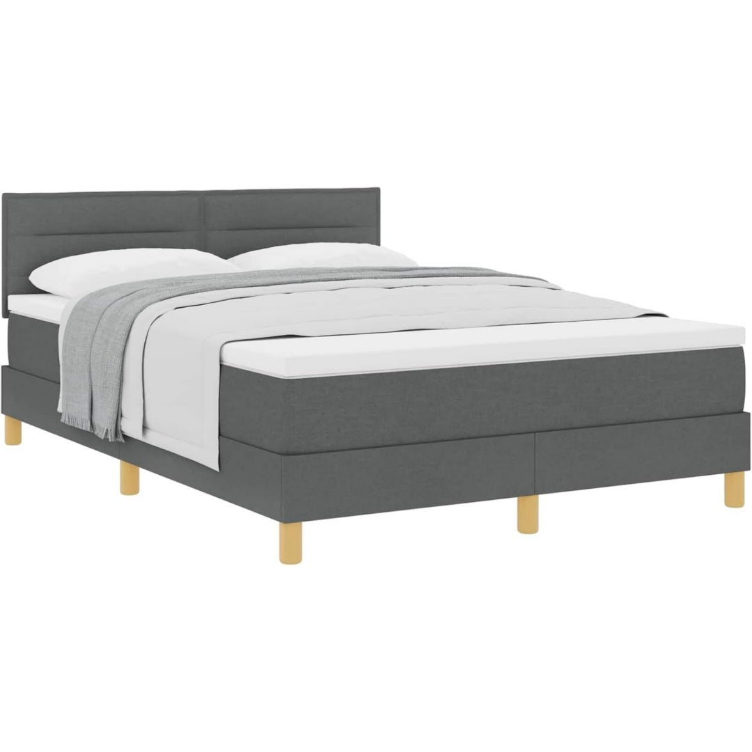 Eine Gestaltung in Dunkelgrau kennzeichnet das Boxspringbett