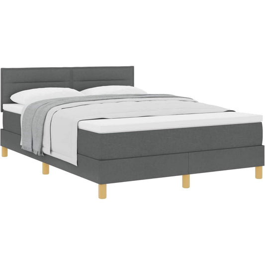 Eine Gestaltung in Dunkelgrau kennzeichnet das Boxspringbett